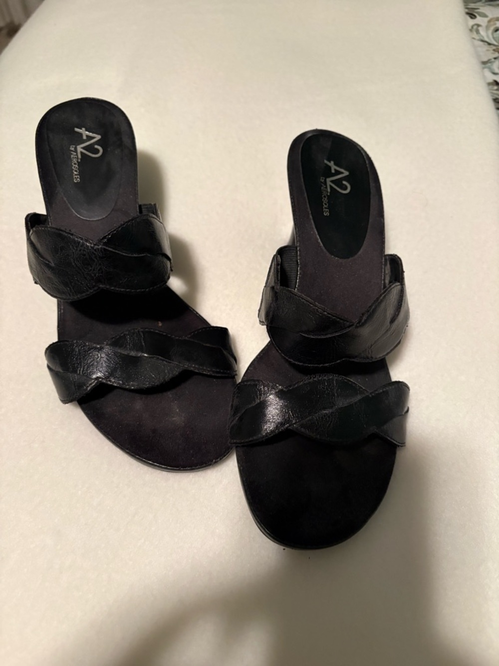 Comfortable and stylish Aerosole slip on heeled sandal.